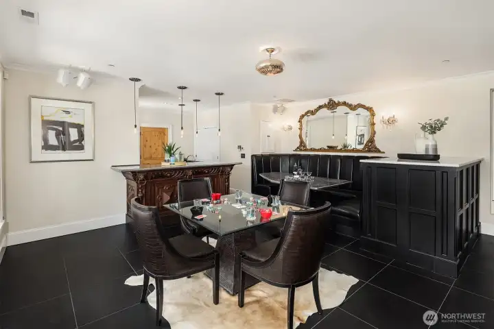 Entertainment/bonus room with hand carved oak bar from 1900s and handmade zinc counters.  Great for entertaining or just relaxing.