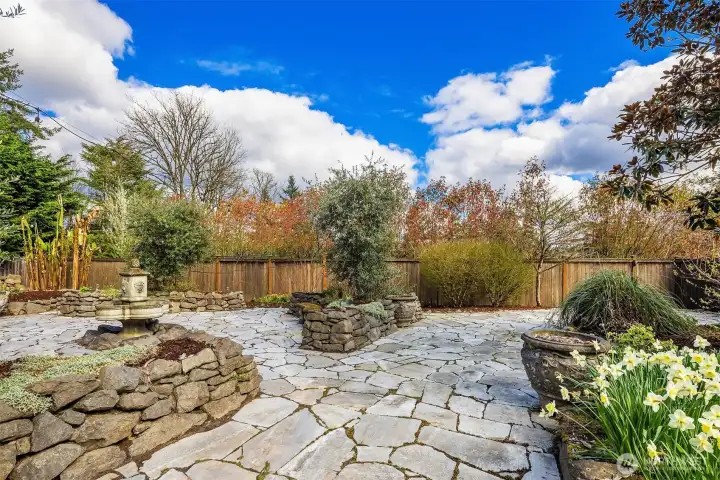 Includes vegetable beds, olive trees, banana plants and Japanese maples.