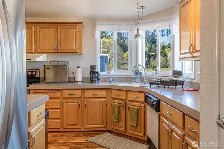 Spacious Kitchen with tons of countertops pace and cupboards.