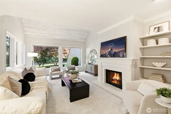 formal living & dining spaces flow effortlessly to a deck & patio