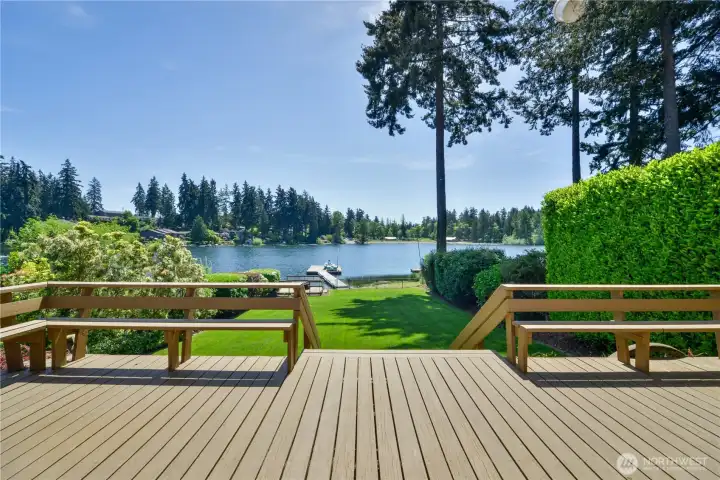 The large deck with the lake in the background.