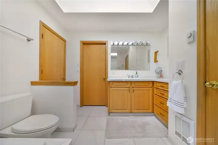Primary bathroom has a tub and separate shower.