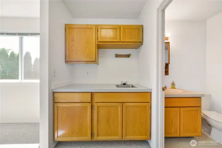 The three quarter bath in the attached bonus room. Convert this space to a very funtional kitchen.