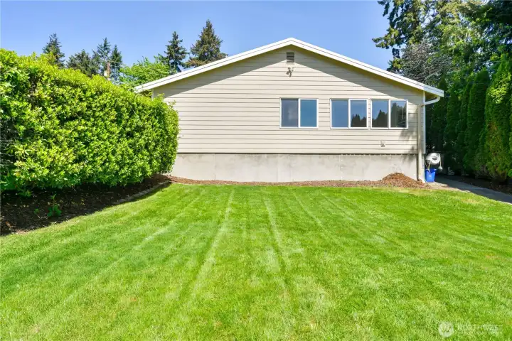 This photo is taken from the back of the detached garage/bonus room toward the house.