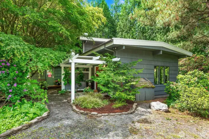 Pathway to front door. Straight leads to mud room