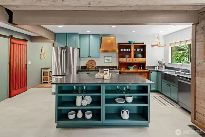 Kitchen has heated flooring, walk in pantry w/microwave and dining space