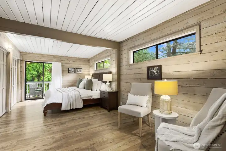 Primary bath with sitting area and exterior deck