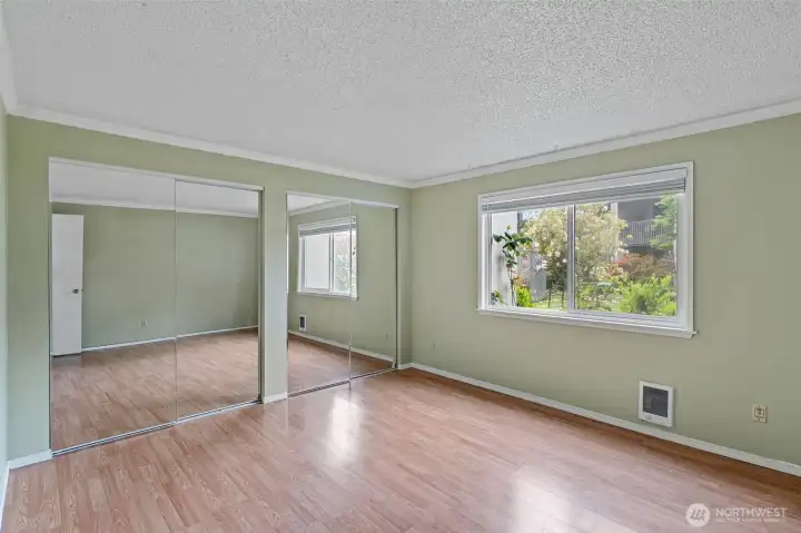Dual closets with full mirrored doors