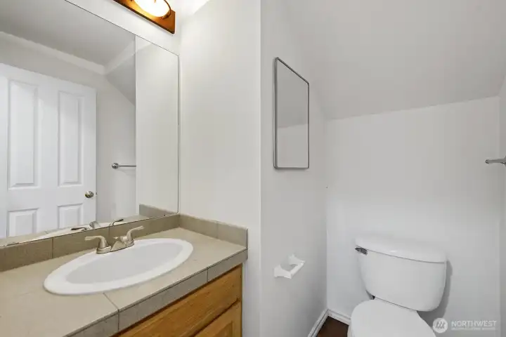 Convenient main level powder room.