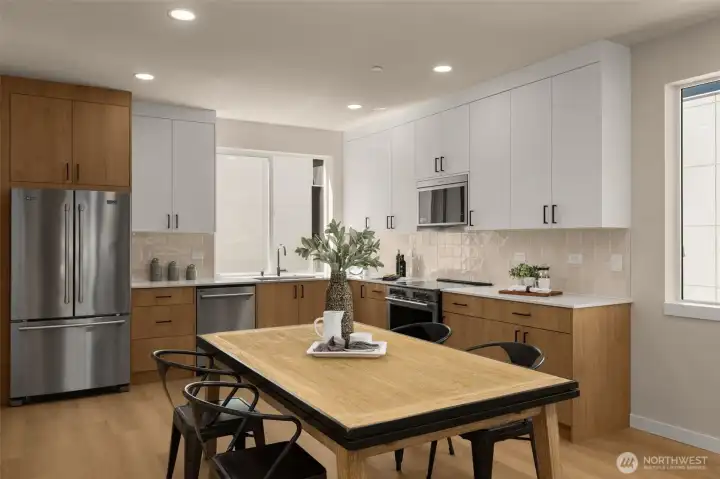 Perfect look at the open dining space right off the kitchen, making hosting a breeze (these are of model home, similar finishes and layout) Perfect look at the open dining space right off the kitchen, making hosting a breeze (these are of model home, similar finishes and layout)