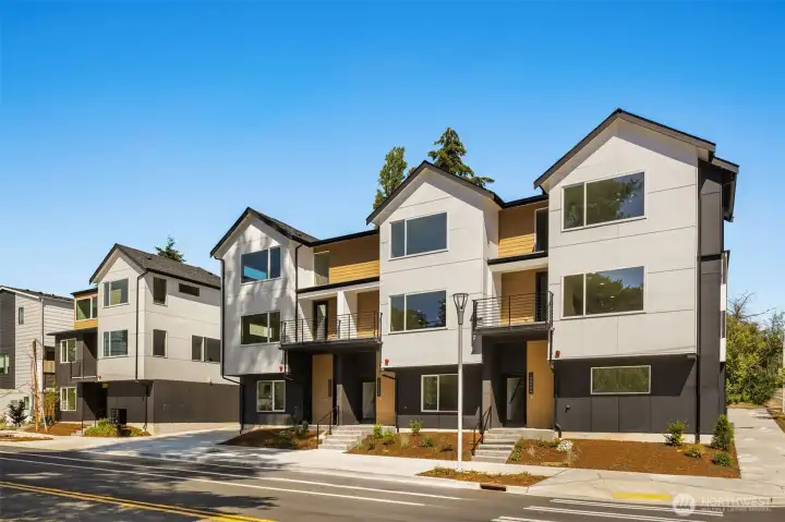 Welcome to Grove Pointe! Beautiful, modern townhome exterior showcasing contemporary architectural lines and exceptional curb appeal. Welcome to Grove Pointe! Beautiful, modern townhome exterior showcasing contemporary architectural lines and exceptional curb appeal.