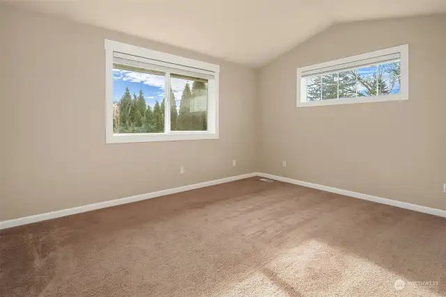 Upstairs open concept family room with lots of natural light