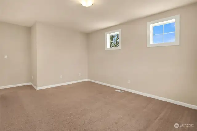 Upstairs open concept family room with lots of natural light