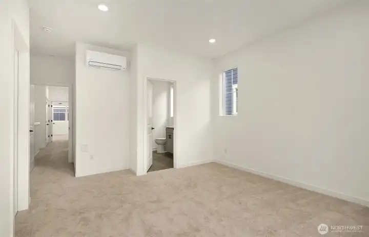 Primary bedroom with mini-split AC and heat system