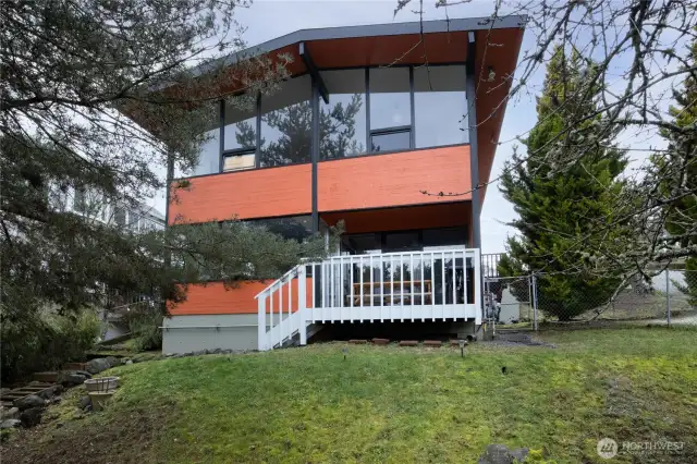 Gorgeous picture windows and a fresh deck