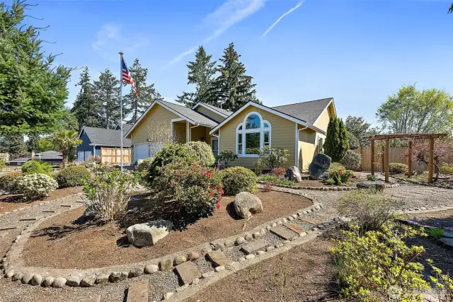 Front of the house showing professional landscaping.