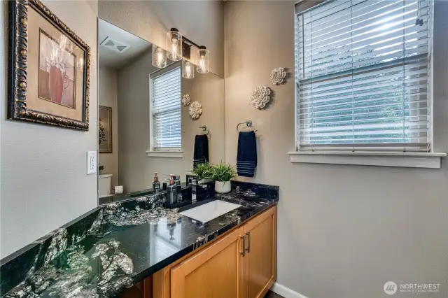 Powder room is nicely updated.