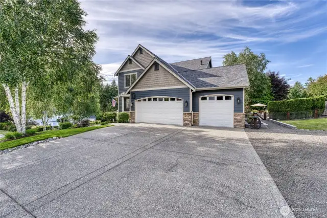 No lack of parking here...flat driveway with additional parking to the right.