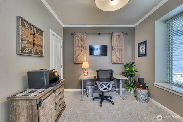 Bedroom on the mainfloor is currently being used as an office.