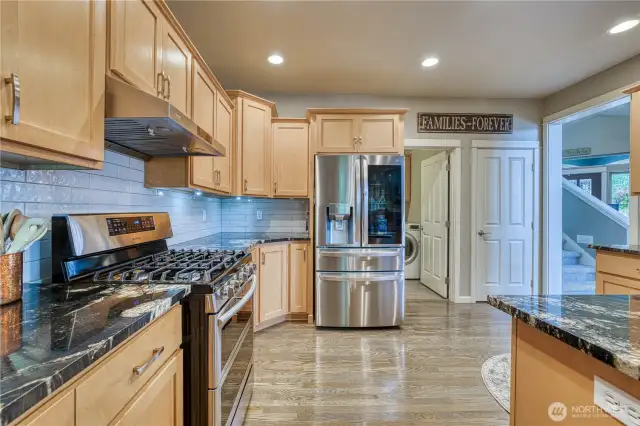 Lots of cabinets and newer granite counter tops this kitchen is sure to please.