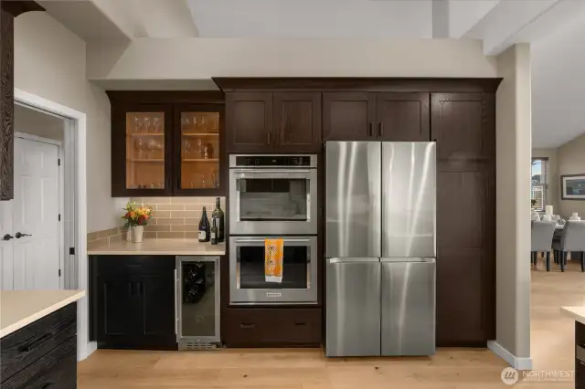 Wine fridge, double oven, Dacor refrigerator, pantry cabinet, under cabinet lighting and more