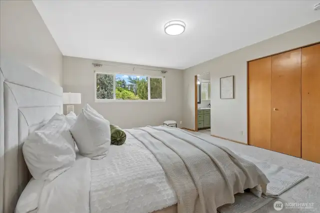 Bright & Spacious Primary Bedroom with Two Closets, main floor
