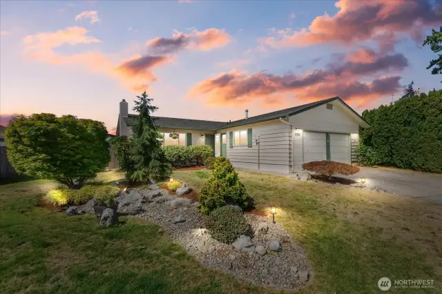 Beautiful sunsets are seen from the rear yard of this wonderful home.
