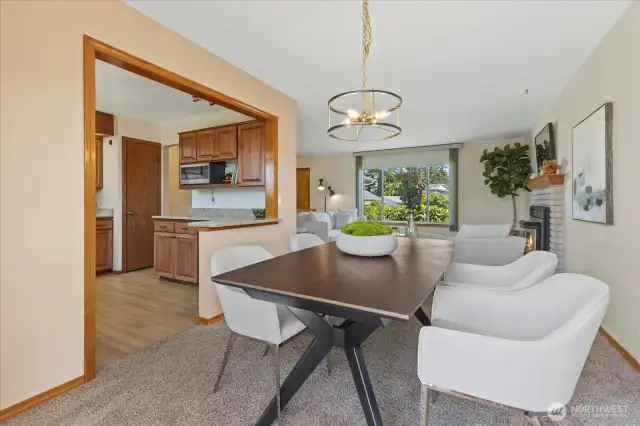 Updated Modern Lighting accents the Dining.