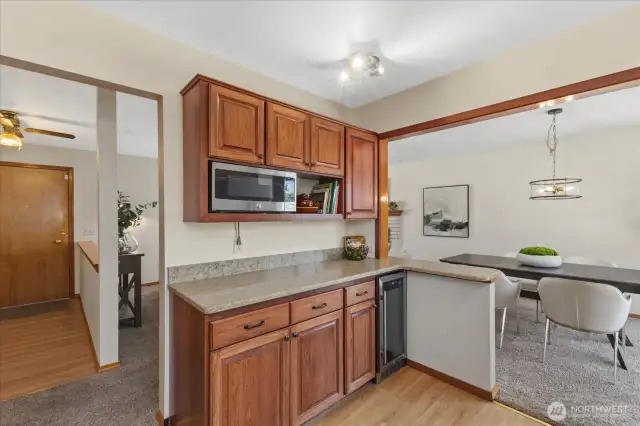 Newer Upper soft close cabinets and the Beverage Cooler were added when the kitchen was updated with the Stainless appliances, Quartz Counters & LPV flooring.