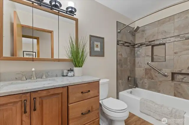 Main Bath is updated with full Tile Surround and Quartz Counters.