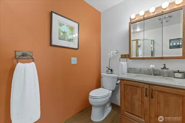Primary 3/4 Bath is appointed with a Quartz Counter on Vanity.