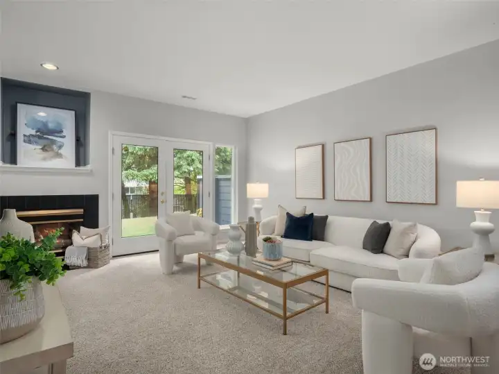 Living room has french doors leading out to patio