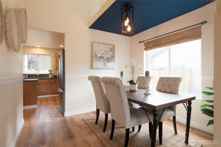 The formal dining room offers an inviting space for special gatherings and celebrations. With its natural light, it’s perfect for hosting dinner parties or enjoying special meals in style.