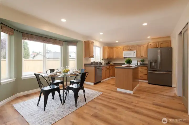 Enjoy morning coffee in the sunny eating nook framed by a charming bay window. It’s a cheerful spot to start your day or enjoy casual meals.