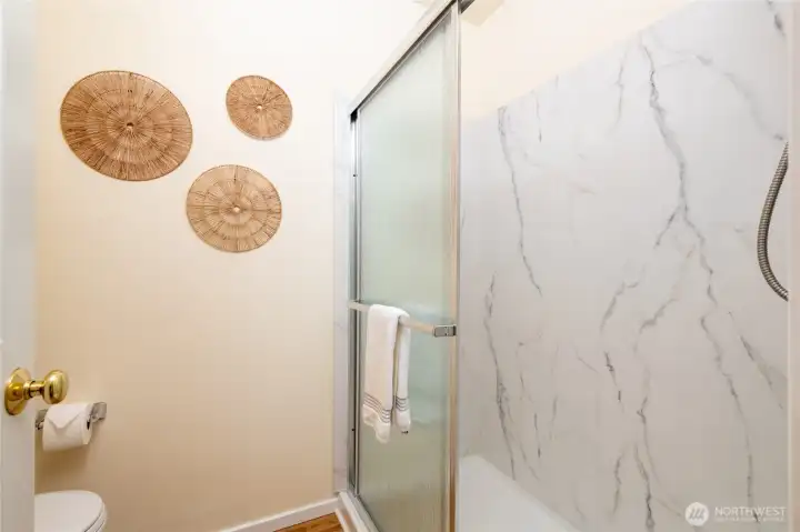 The primary EnSuite enjoys this brand new, walk-in shower.