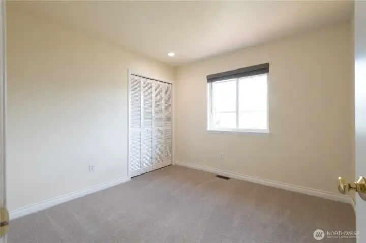 Bedroom #3, Secondary bedrooms provide flexibility for guests, or even a home office. Each space is filled with natural light and comfort.