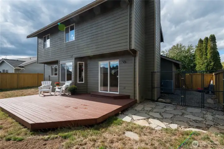 A dedicated dog run at right of photo makes this home especially pet-friendly, giving your four-legged family members a safe place to play. It’s a thoughtful feature that enhances both convenience and peace of mind.
