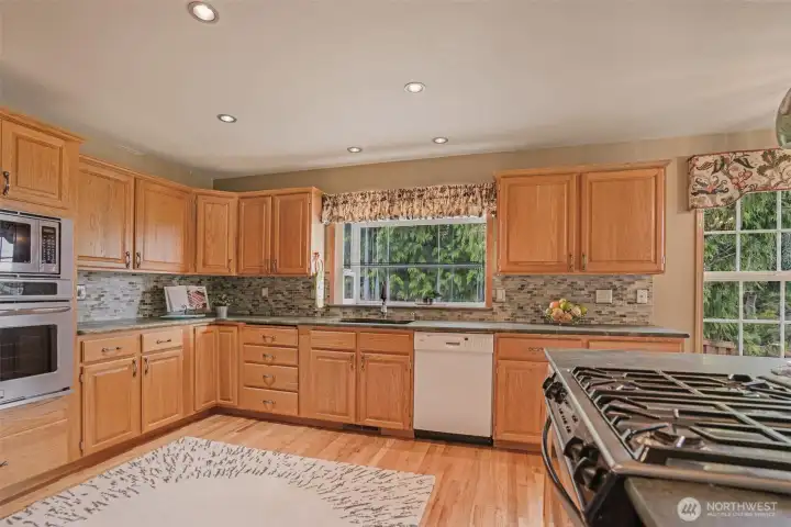 Sunlight pours in through the large window, creating a bright, cheerful space you’ll love to cook and create in.