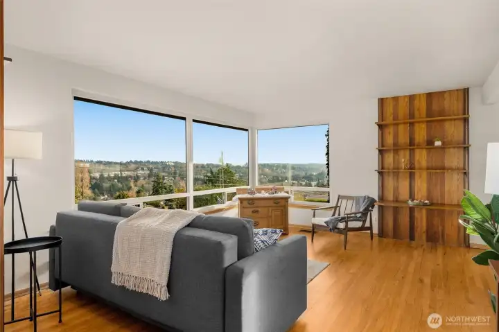 Corner picture windows showcase Mt Rainier