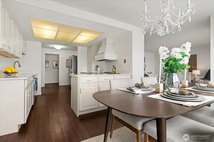 Beautiful crystal chandelier, offers an elegant ambiance to the all-occasion dining room