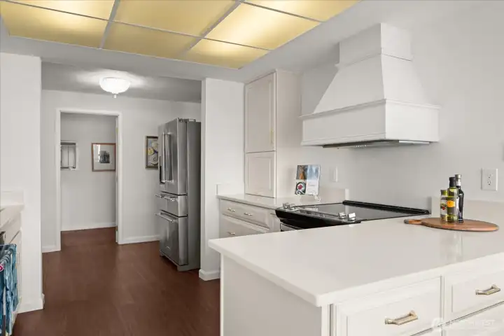 Spacious kitchen allows ample floor space for moving around while preparing meals