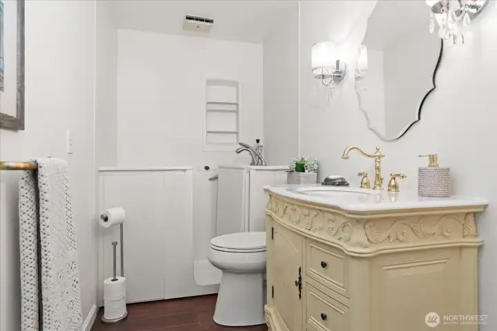 Remodeled main full bathroom offering a state-of-the-art, walk-in bath tub with door, and free standing custom vanity