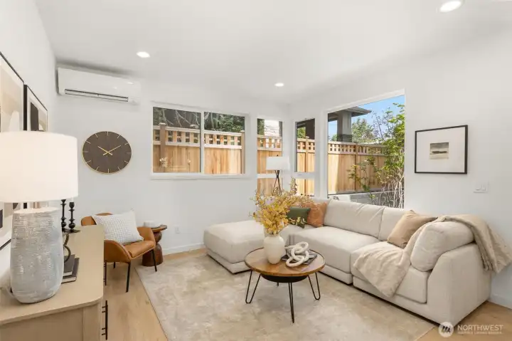 Featuring premium appliances, custom cabinetry, and expansive quartz counters for effortless meal prep.