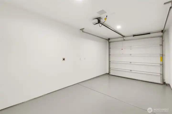 The attached garage provides secure parking and extra space for gear or seasonal storage.