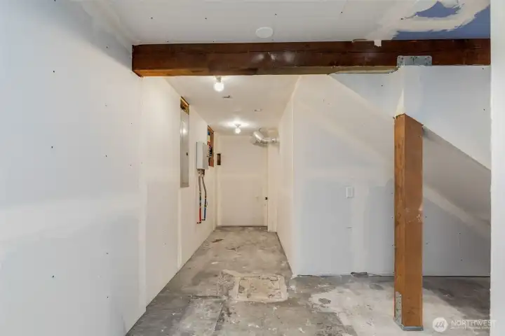 Utility space downstairs offers easy access to high-efficiency utilities, tons of storage, and an additional W/D hookup