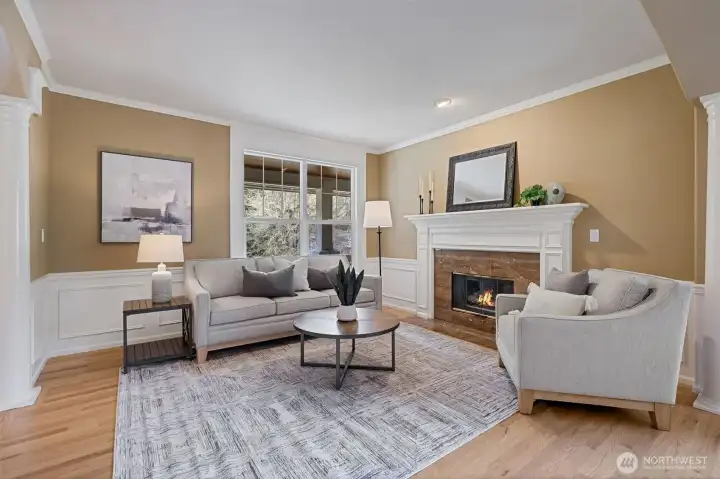 Formal living room with a gas fireplace.