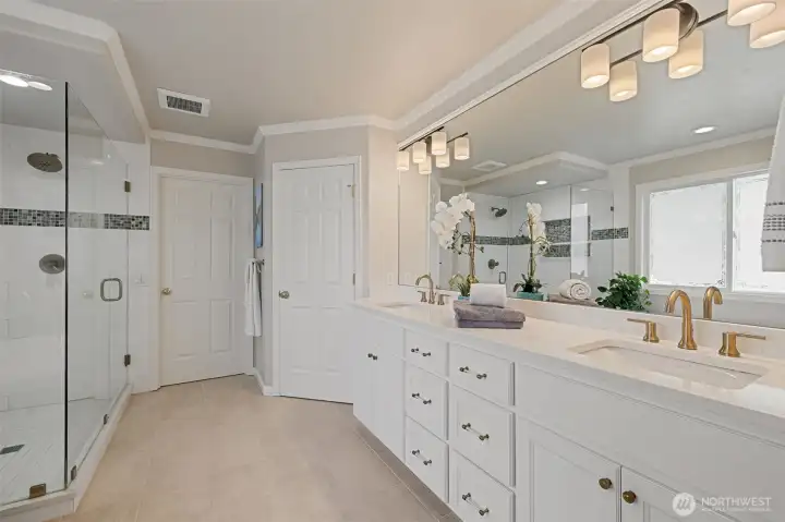 Remodeled 5 piece primary bath.