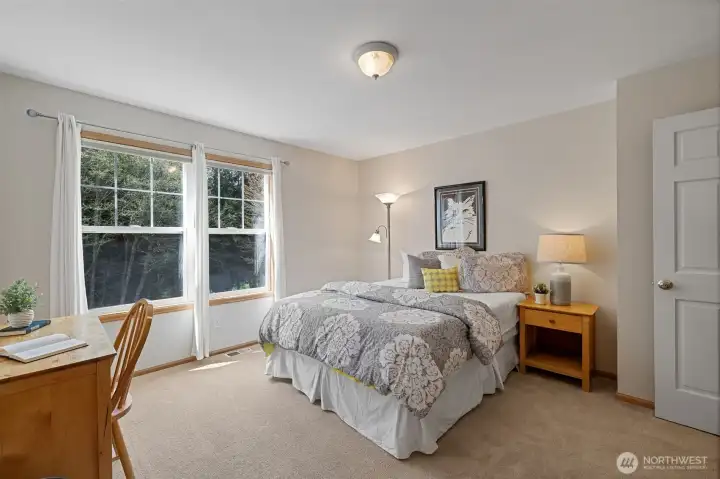 Another secondary bedroom with a private 3/4 bath.