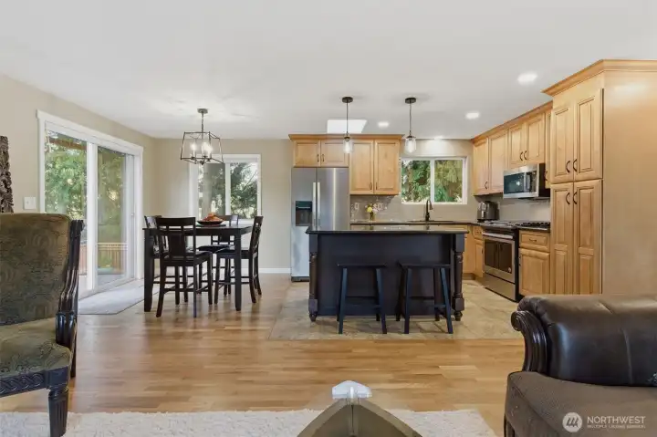 Kitchen is open to dining room and living room