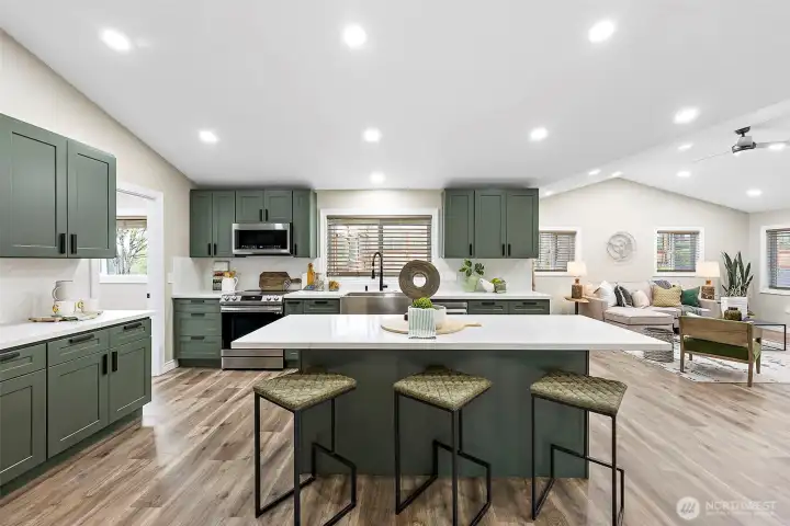 Fabulous kitchen with quartz counters, backsplashes and stainless appliances.
